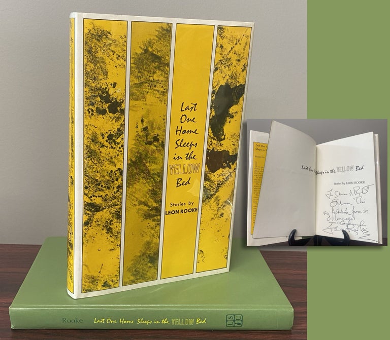 Item #33709 LAST ONE HOME SLEEPS IN A YELLOW BED Inscribed by Rooke. Leon Rooke